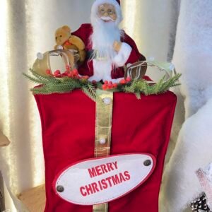 Santa Claus Figurine on Red Gift Bag – Merry Christmas Holiday Decoration